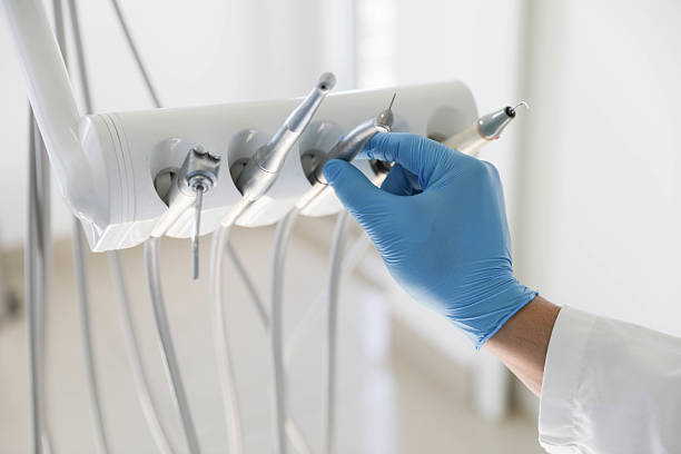 Professional Root Canal Treatment technician working in Weston, MO
